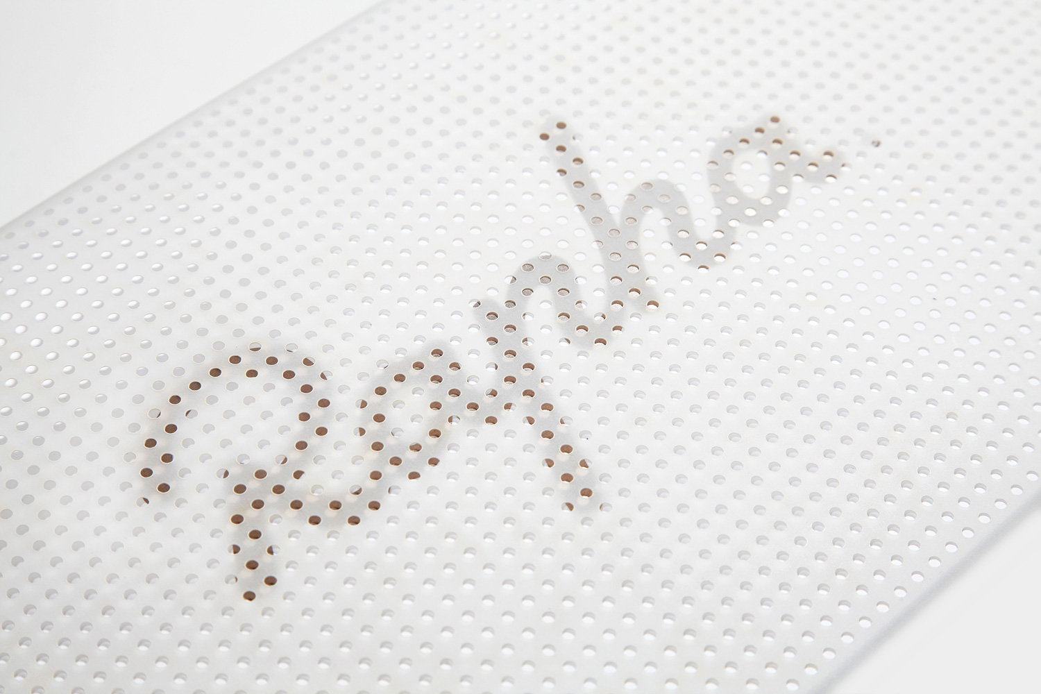 Rapha perforated logo detail