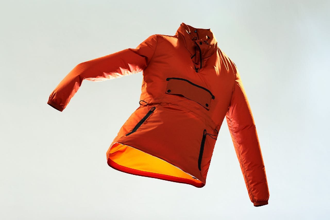 Orange jacket in the air