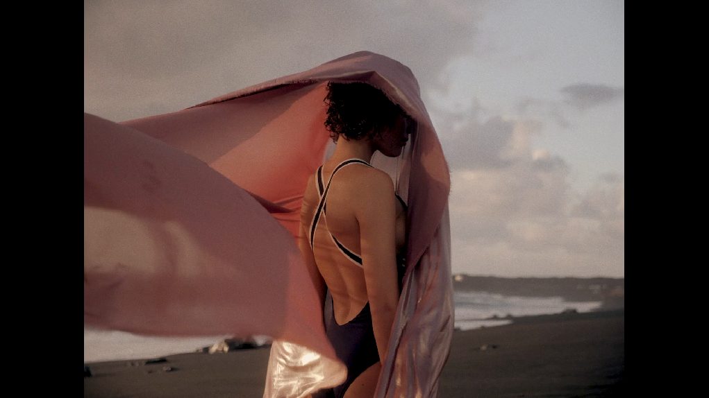 Pink fabric in the wind on a beach