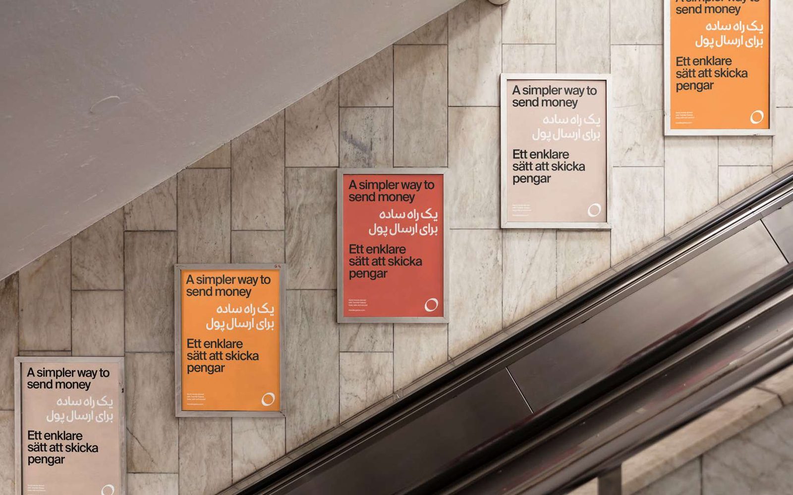 Poster campaign on an escalator wall