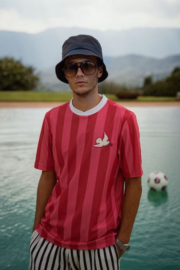 Striped shirt, bucket hat, poolside