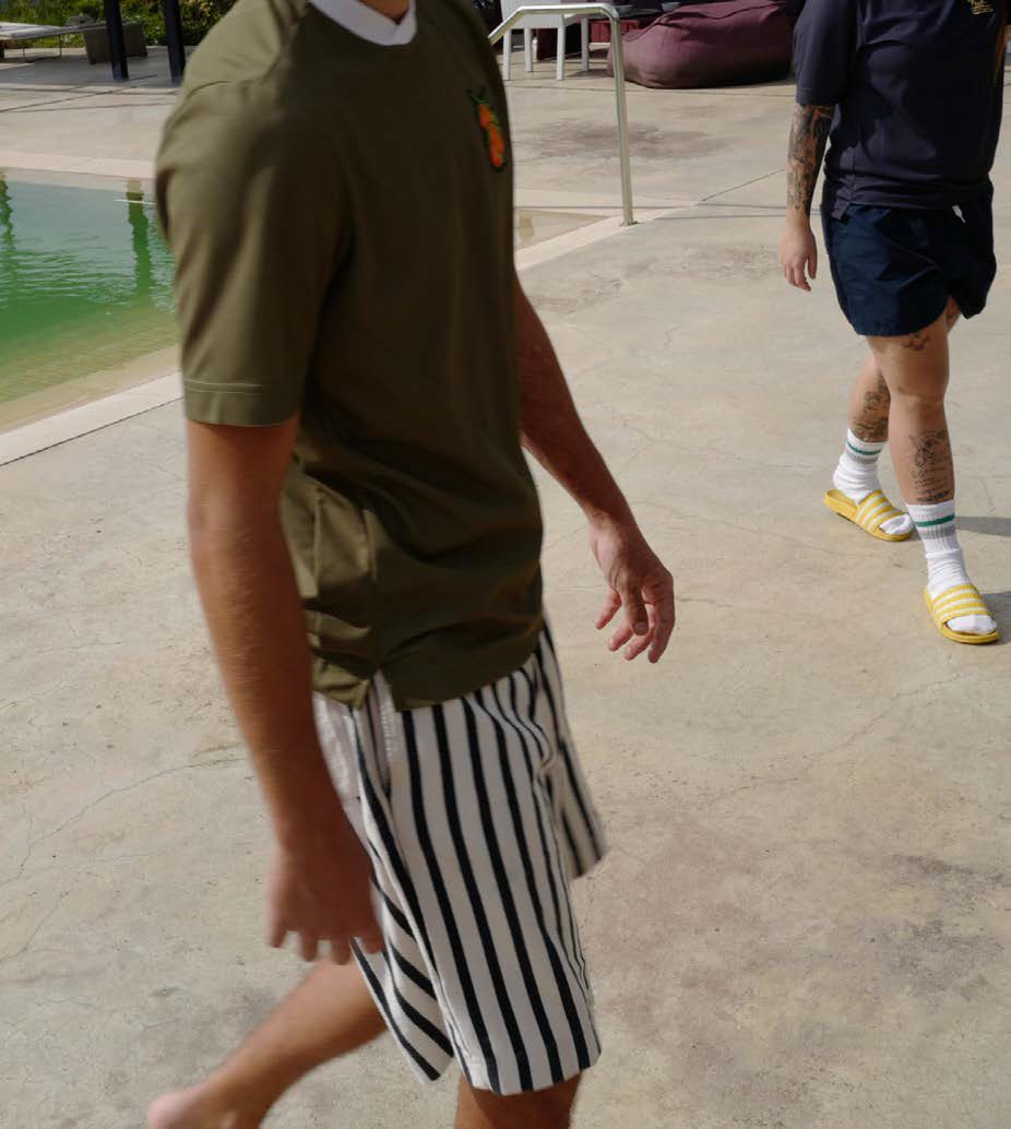 Kicking a ball by the pool