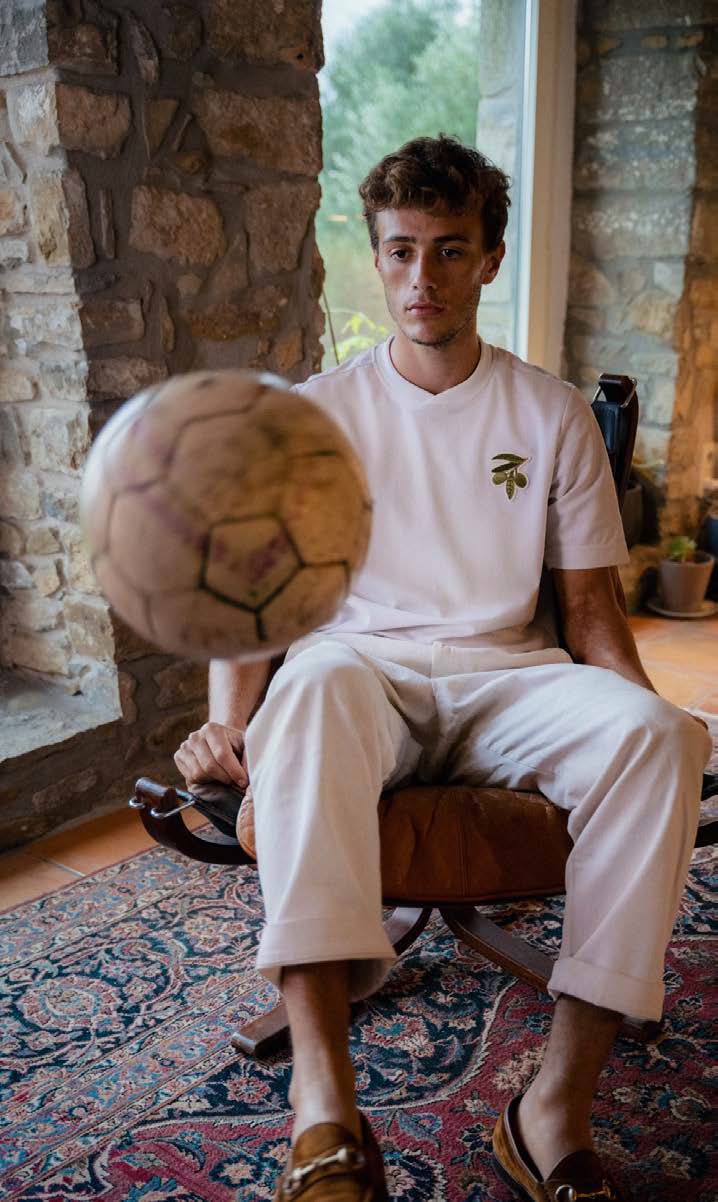Seated with a ball, stone room