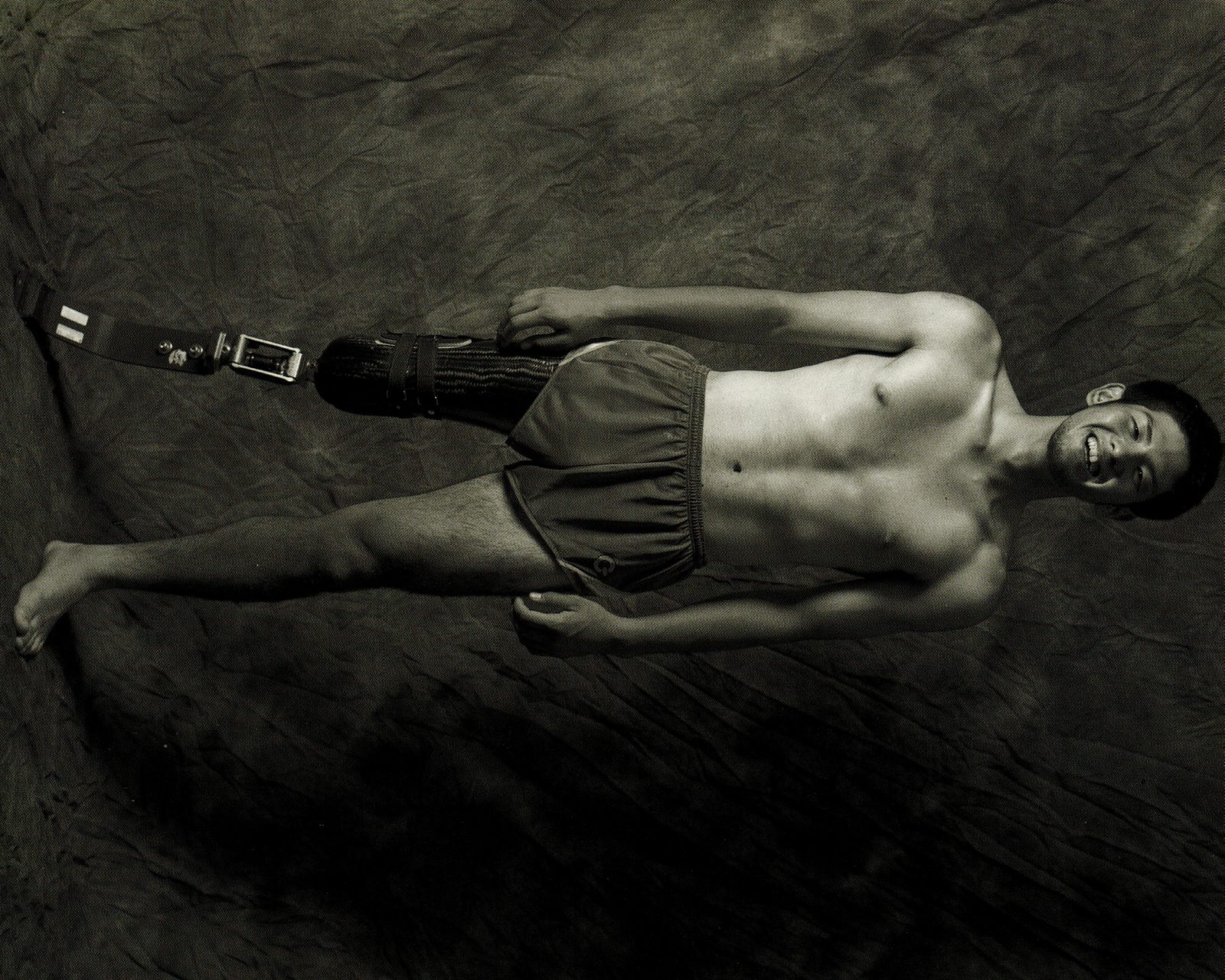 Athlete standing, black and white