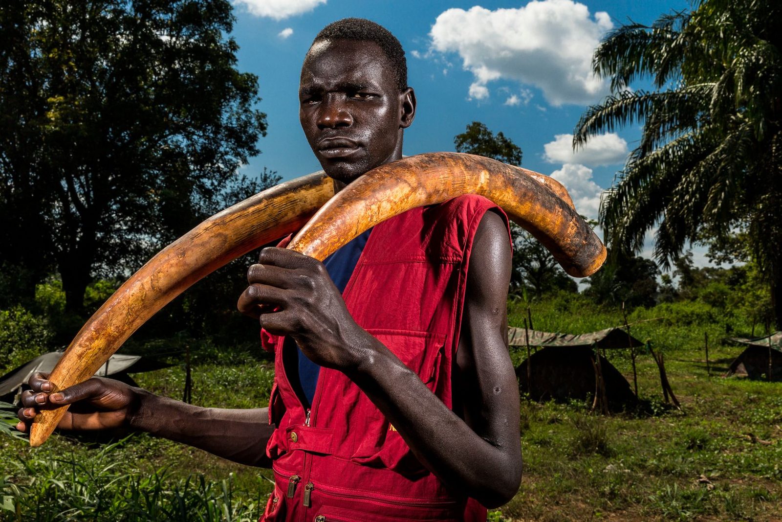 Man carrying an ivory tusk