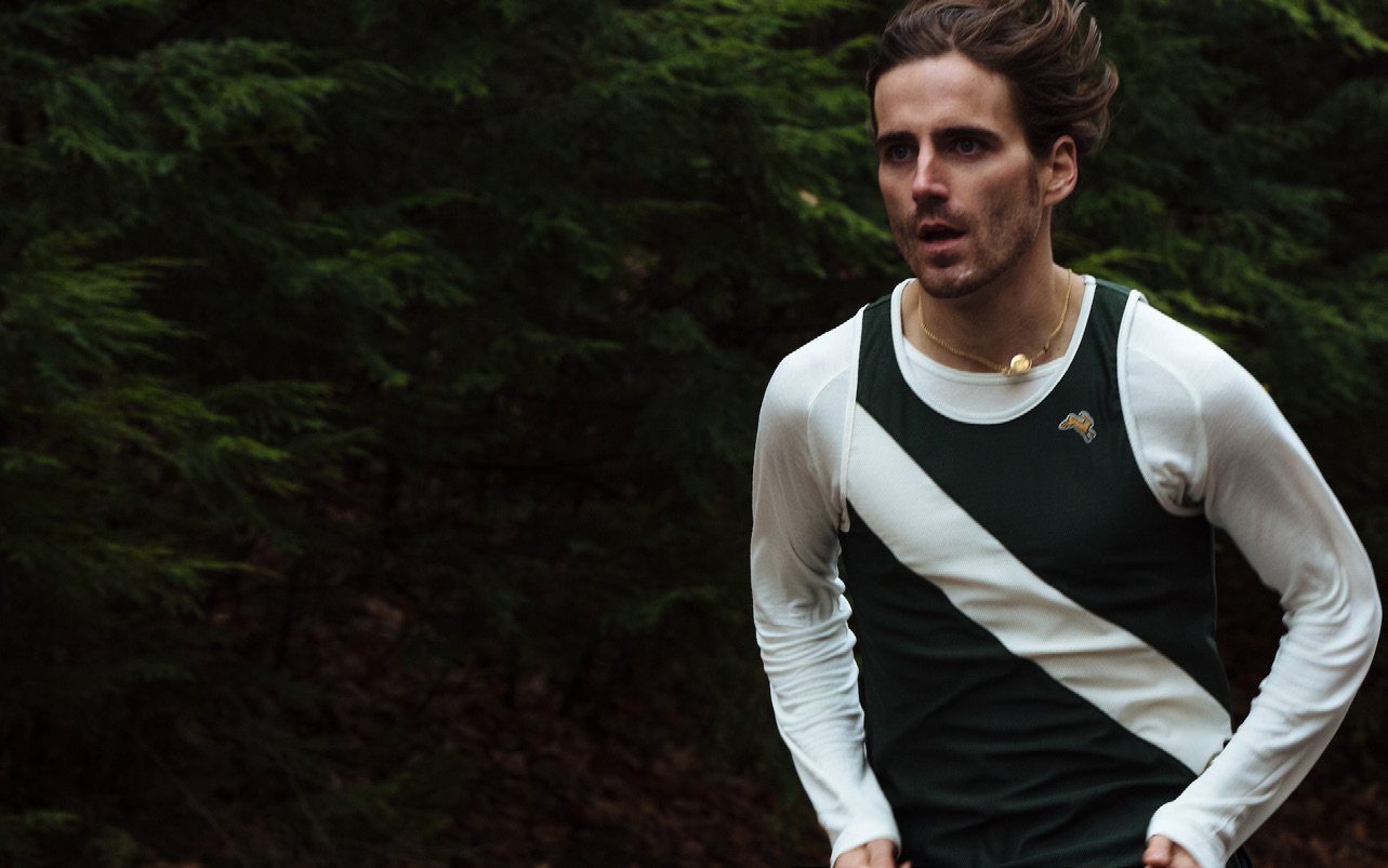Runner in a sash singlet